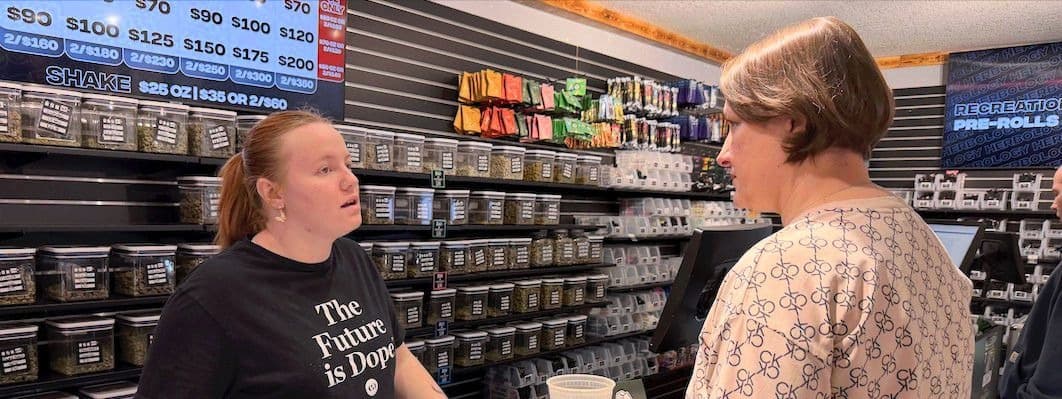 Questions to Ask a Budtender at a Michigan Dispensary Herbology budtender helping a customer at a Michigan cannabis dispensary